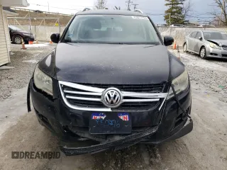 2011 Volkswagen Tiguan SEL with VIN WVGBV7AX4BW553986, listed as a Copart auction lot 43873765 with 140,097 mi miles and Salvage Title. Bid and sale history available at DreamBid. Image 5.