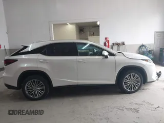 2021 Lexus RX with VIN 2T2JZMDA0MC295323, listed as a IAAI auction lot 42006747 with 45,160 mi miles. Bid and sale history available at carsss.com. Image 13.