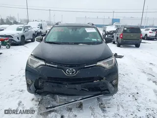 2018 Toyota RAV4 XLE with VIN 2T3RFREV8JW851250, listed as a IAAI auction lot 41164994 with 63,005 mi miles. Bid and sale history available at carsss.com. Image 12.