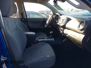2018 Toyota Tacoma SR with VIN 3TMCZ5AN3JM138480, listed as a IAAI auction lot 41080910 with 99,225 mi miles. Bid and sale history available at carsss.com. Image 5.