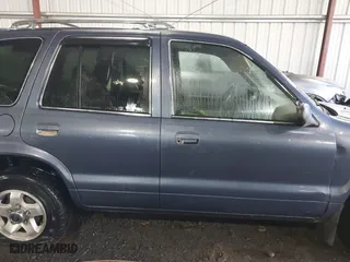 2002 Kia Sportage with VIN KNDJB723X25134499, listed as a IAAI auction lot 41273605 with 1 mi miles. Bid and sale history available at carsss.com. Image 12.