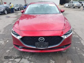 2021 Mazda 3 with VIN JM1BPBDL6M1305765, listed as a IAAI auction lot 42063684 with 61,011 mi miles and . Bid and sale history available at DreamBid. Image 12.