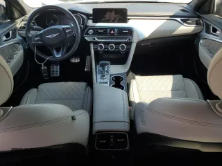 2022 Genesis G70 3.3T with VIN KMTG54TE2NU095029, listed as a Copart auction lot 64011744 with 58,207 mi miles and Salvage Title. Bid and sale history available at carsss.com. Image 8.