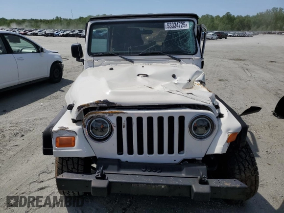 2005 Jeep Wrangler X with VIN 1J4FA39S75P332586, listed as a Copart auction lot 53334725 with 96,728 mi miles and Salvage title. Bid and sale history available at DreamBid. Image 5.