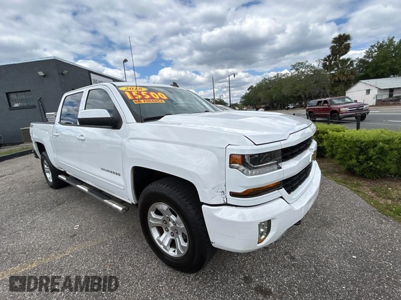 2018 Chevrolet Silverado 1500 LT with VIN 3GCUKREC4JG432719, listed as a Copart auction lot 52822625 with 161,100 mi miles and Clean Title. Bid and sale history available at carsss.com. Image 1.