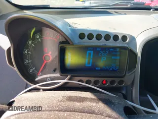 2013 Chevrolet Sonic LT with VIN 1G1JC5SH6D4247624, listed as a IAAI auction lot 41956996 with 144,392 mi miles and . Bid and sale history available at DreamBid. Image 7.
