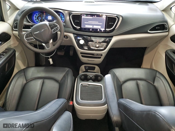 2023 Chrysler Pacifica Hybrid Touring L with VIN 2C4RC1L74PR575358, listed as a Copart auction lot 43261875 with 35,077 mi miles and Clean Title. Bid and sale history available at carsss.com. Image 8.