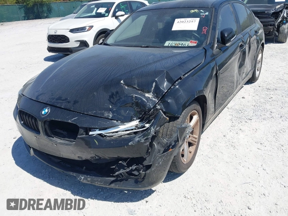 2013 BMW 3 Series 328i with VIN WBA3C1C57DF434854, listed as a IAAI auction lot 42023257 with 125,960 mi miles and . Bid and sale history available at carsss.com. Image 6.