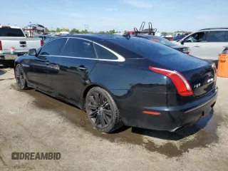 2013 Jaguar XJ Supercharged with VIN SAJWA2GE3DMV42875, listed as a Copart auction lot 71409324 with 129,422 mi miles and Salvage title. Bid and sale history available at DreamBid. Image 2.