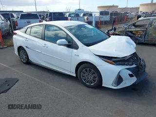 2022 Toyota Prius LE z VIN JTDKAMFPXN3202707, wystawiony jako IAAI lot #42185475 z przebiegiem Nie podano mil oraz . Historia ofert i sprzedaży dostępna na DreamBid. Obrazek 1.