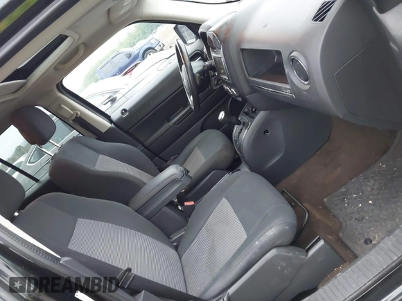 2014 Jeep Patriot Latitude with VIN 1C4NJRFB1ED501740, listed as a IAAI auction lot 42722549 with 147,974 mi miles and . Bid and sale history available at DreamBid. Image 5.