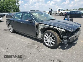 2008 Jaguar XJ with VIN SAJWA79B28SH26841, listed as a Copart auction lot 59914574 with 0 mi miles and Salvage Title. Bid and sale history available at carsss.com. Image 4.