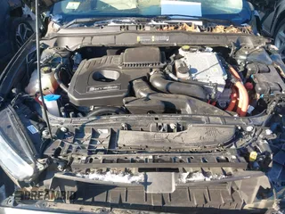 2015 Ford Fusion SE Hybrid with VIN 3FA6P0LUXFR165766, listed as a IAAI auction lot 41409353 with 32,388 mi miles. Bid and sale history available at carsss.com. Image 10.