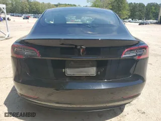 2023 Tesla Model 3 with VIN 5YJ3E1EA2PF438438, listed as a Copart auction lot 52901375 with 63,181 mi miles and Salvage Title. Bid and sale history available at carsss.com. Image 6.