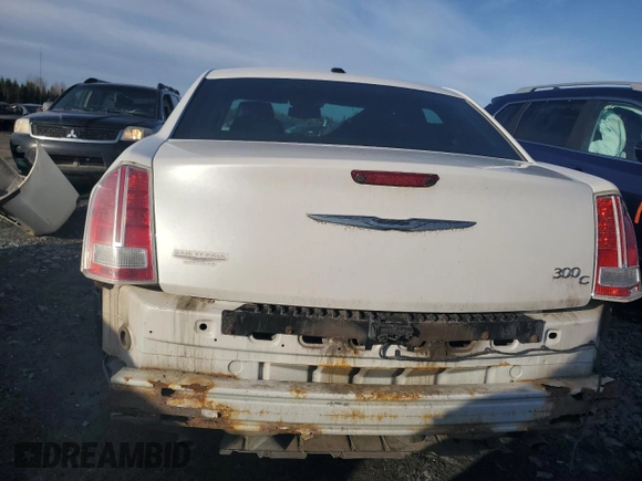 2014 Chrysler 300 C z VIN 2C3CCAEG8EH320769, wystawiony jako Copart lot #55211055 z przebiegiem 163 430 mil mil oraz Szkoda całkowita • Salvage title. Historia ofert i sprzedaży dostępna na DreamBid. Obrazek 6.