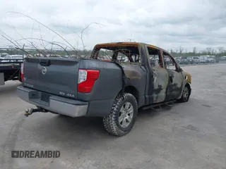 2017 Nissan Titan SV with VIN 1N6AA1EJ5HN539685, listed as a IAAI auction lot 41680846 with Not Provided miles and . Bid and sale history available at DreamBid. Image 4.