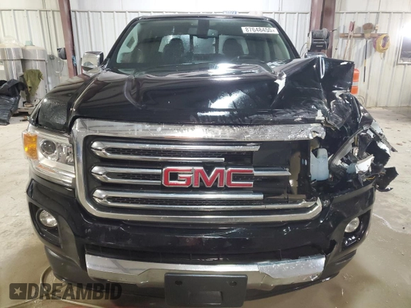 2016 GMC Canyon 2WD SLT with VIN 1GTG5DE39G1100516, listed as a Copart auction lot 87648455 with 243,815 mi miles and Salvage Title. Bid and sale history available at carsss.com. Image 5.