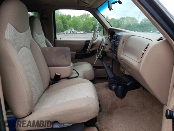 2001 Mazda B-Series Truck DS z VIN 4F4YR16U31TM01851, wystawiony jako Copart lot #57491815 z przebiegiem 113 145 mil mil oraz Szkoda całkowita • Salvage title. Historia ofert i sprzedaży dostępna na DreamBid. Obrazek 10.
