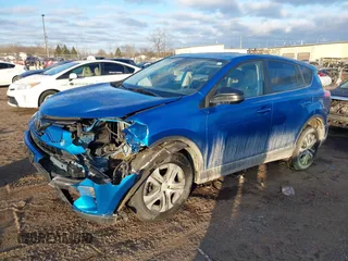 2018 Toyota RAV4 LE with VIN JTMBFREV4JJ717092, listed as a IAAI auction lot 41492235 with 127,643 mi miles. Bid and sale history available at carsss.com. Image 2.