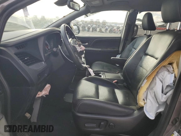 2020 Toyota Sienna SE with VIN 5TDXZ3DC0LS062302, listed as a Copart auction lot 46988815 with 97,304 mi miles and Salvage Title. Bid and sale history available at DreamBid. Image 7.