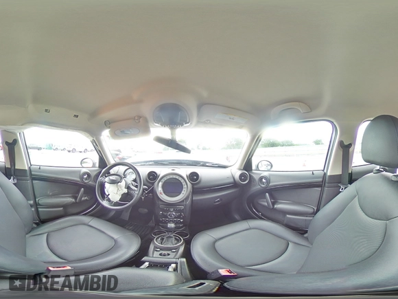 2012 MINI Countryman with VIN WMWZB3C5XCWM06778, listed as a Copart auction lot 61201285 with 64,676 mi miles and Salvage title. Bid and sale history available at DreamBid. Image 14.