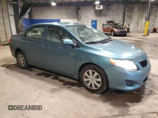 2010 Toyota Corolla with VIN JTDBU4EE7A9121808, listed as a Copart auction lot 57801605 with 114,778 mi miles and Salvage title. Bid and sale history available at DreamBid. Image 4.