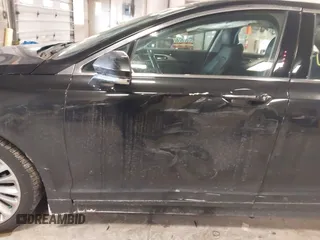 2013 Lincoln MKZ with VIN 3LN6L2J98DR803778, listed as a IAAI auction lot 41651370 with 190,840 mi miles. Bid and sale history available at carsss.com. Image 6.