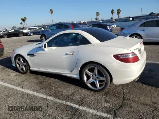 2014 Mercedes-Benz SLK-Class SLK 350 with VIN WDDPK5HA1EF078199, listed as a Copart auction lot 70853244 with 80,976 mi miles and Salvage Title. Bid and sale history available at carsss.com. Image 2.