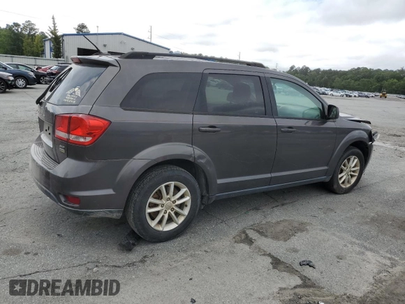 2017 Dodge Journey SXT with VIN 3C4PDCBG7HT510231, listed as a Copart auction lot 56735015 with 168,312 mi miles and Salvage title. Bid and sale history available at DreamBid. Image 3.