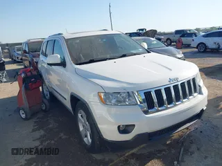 2011 Jeep Grand Cherokee Laredo z VIN 1J4RR4GG4BC703071, wystawiony jako IAAI lot #41992878 z przebiegiem 126 199 mil mil oraz . Historia ofert i sprzedaży dostępna na DreamBid. Obrazek 1.