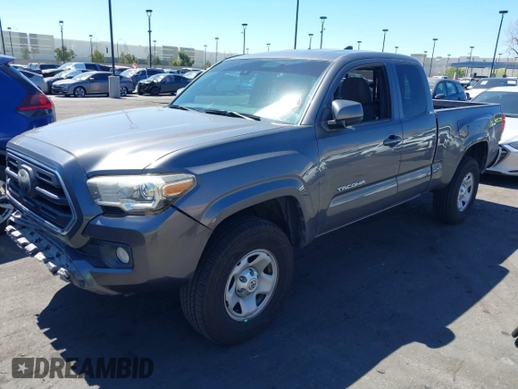 2018 Toyota Tacoma SR with VIN 5TFRX5GN1JX118441, listed as a IAAI auction lot 41870266 with 95,612 mi miles and . Bid and sale history available at DreamBid. Image 18.