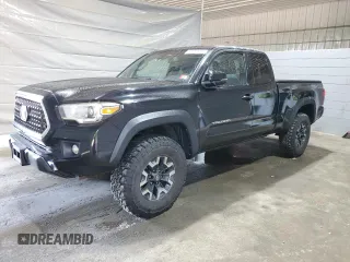 2018 Toyota Tacoma SR5 with VIN 5TFSZ5AN9JX123259, listed as a Copart auction lot 60456975 with 80,179 mi miles and Salvage title. Bid and sale history available at DreamBid. Image 1.