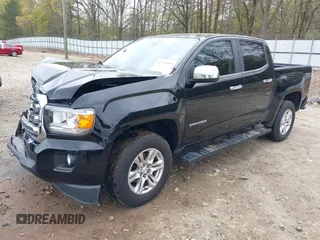 2019 GMC Canyon 4WD SLE with VIN 1GTG6CEN4K1329011, listed as a IAAI auction lot 41920100 with 82,343 mi miles. Bid and sale history available at carsss.com. Image 2.