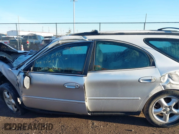 2001 Ford Taurus SE Standard z VIN 1FAFP582X1G268769, wystawiony jako IAAI lot #41837093 z przebiegiem 42 261 mil mil oraz . Historia ofert i sprzedaży dostępna na DreamBid. Obrazek 14.