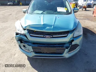 2013 Ford Escape SEL with VIN 1FMCU9HX2DUA71931, listed as a IAAI auction lot 41757318 with 149,344 mi miles. Bid and sale history available at carsss.com. Image 6.