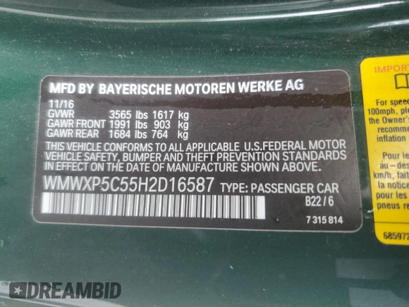 2017 MINI Hardtop Cooper with VIN WMWXP5C55H2D16587, listed as a Copart auction lot 60855195 with 77,769 mi miles and Salvage title. Bid and sale history available at DreamBid. Image 12.