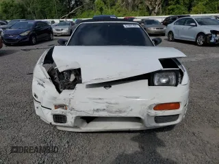 1993 Nissan 240SX SE Limited Edition z VIN JN3MS37AXPW202518, wystawiony jako Copart lot #51807405 z przebiegiem 260 905 mil mil oraz Szkody całkowita. Historia ofert i sprzedaży dostępna na DreamBid. Obrazek 5.