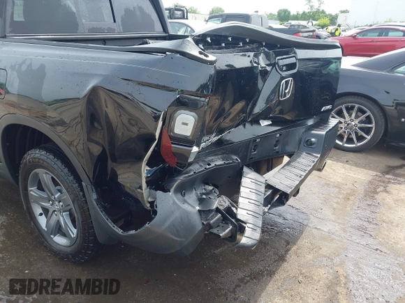 2023 Honda Ridgeline RTL-E with VIN 5FPYK3F76PB042100, listed as a IAAI auction lot 42274861 with 16,822 mi miles and . Bid and sale history available at DreamBid. Image 6.