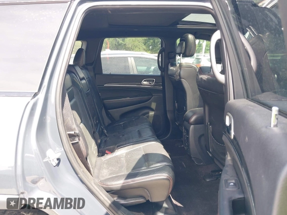 2017 Jeep Grand Cherokee Trailhawk with VIN 1C4RJFLG4HC843628, listed as a IAAI auction lot 42053878 with 83,551 mi miles and . Bid and sale history available at DreamBid. Image 8.