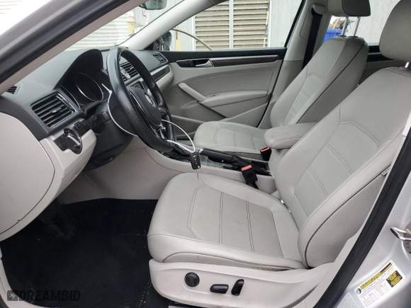 2016 Volkswagen Passat 1.8T SE with VIN 1VWBT7A34GC030092, listed as a Copart auction lot 71264114 with 131,798 mi miles and Salvage Title. Bid and sale history available at carsss.com. Image 7.