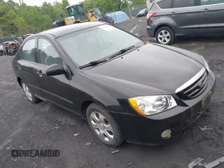 2005 Kia Spectra LX z VIN KNAFE121355138257, wystawiony jako IAAI lot #42323008 z przebiegiem 164 869 mil mil oraz . Historia ofert i sprzedaży dostępna na DreamBid. Obrazek 1.