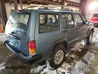 1998 Jeep Cherokee Sport with VIN 1J4FJ68S9WL241184, listed as a Copart auction lot 87360684 with 257,954 mi miles and Clean Title. Bid and sale history available at carsss.com. Image 3.