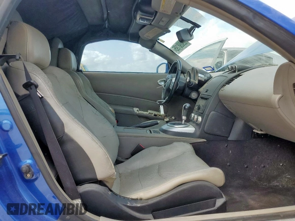 2006 Nissan 350Z Touring z VIN JN1AZ36A36M450869, wystawiony jako Copart lot #59898195 z przebiegiem 160 031 mil mil oraz Czysty tytuł • Clean title. Historia ofert i sprzedaży dostępna na DreamBid. Obrazek 7.