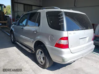 2002 Mercedes-Benz M-Class with VIN 4JGAB54E32A360356, listed as a IAAI auction lot 40540769 with 235,810 mi miles. Bid and sale history available at carsss.com. Image 3.