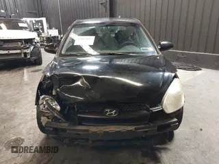 2007 Hyundai Accent SE with VIN KMHCN36C67U026540, listed as a IAAI auction lot 41062633 with 70,143 mi miles. Bid and sale history available at carsss.com. Image 13.