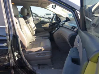 2013 Honda Odyssey EX-L with VIN 5FNRL5H6XDB090768, listed as a IAAI auction lot 42008759 with 116,052 mi miles and . Bid and sale history available at carsss.com. Image 5.