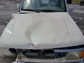 1997 Ford Ranger XLT with VIN 1FTCR10A8VPB29636, listed as a Copart auction lot 57250435 with 215,537 mi miles and Salvage title. Bid and sale history available at DreamBid. Image 11.