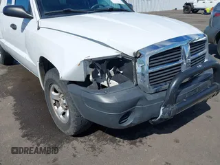 2005 Dodge Dakota ST with VIN 1D7HW22K15S119947, listed as a IAAI auction lot 42372148 with 140,528 mi miles and . Bid and sale history available at DreamBid. Image 6.