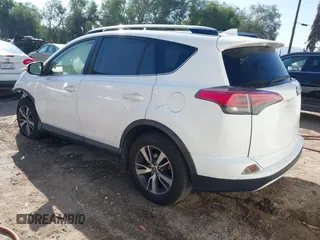 2017 Toyota RAV4 XLE with VIN JTMWFREV9HJ128521, listed as a IAAI auction lot 41658054 with 106,788 mi miles and . Bid and sale history available at DreamBid. Image 3.