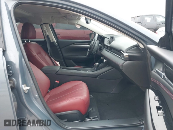 2021 Mazda 6 Carbon Edition with VIN JM1GL1WY0M1600414, listed as a IAAI auction lot 41551393 with 36,780 mi miles and . Bid and sale history available at DreamBid. Image 5.